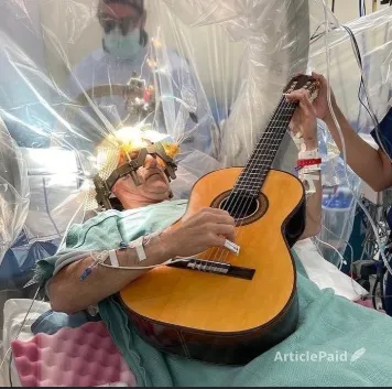 symphony-of-the-mind-playing-guitar-through-brain-surgery