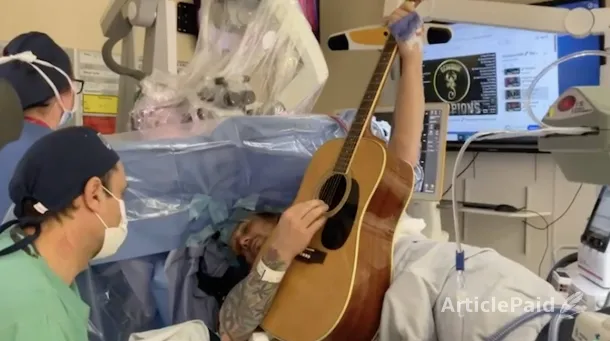 symphony-of-the-mind-playing-guitar-through-brain-surgery