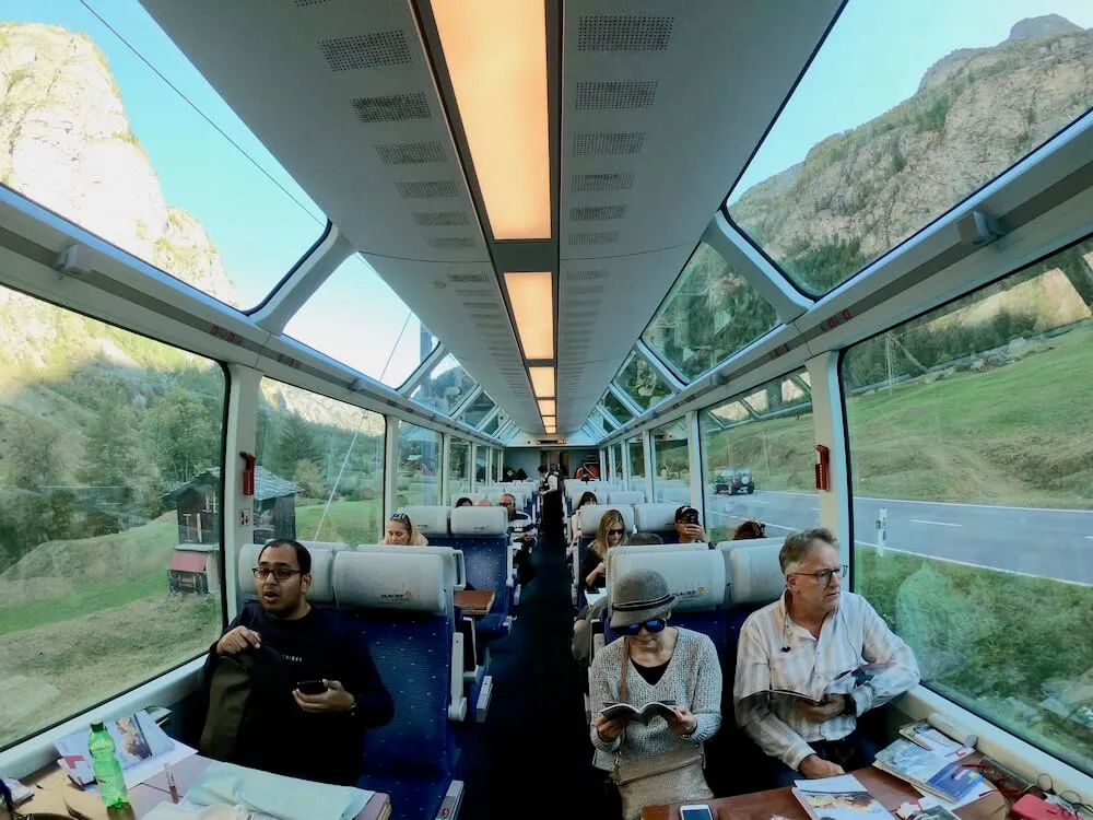 On a Swiss train right now, watching the world glide by. Som...